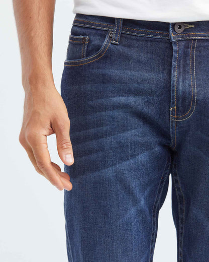 JEANS SLIM FIT DE TIRO MEDIO EN LAVADO OSCURO
