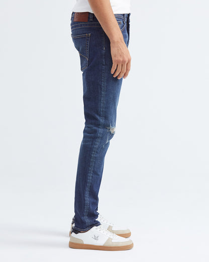 JEANS SLIM FIT DE TIRO MEDIO EN LAVADO OSCURO