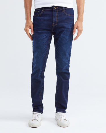 JEANS SLIM FIT DE TIRO MEDIO EN LAVADO OSCURO