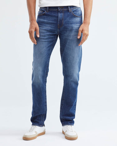 JEANS SLIM FIT DE TIRO MEDIO EN LAVADO MEDIO