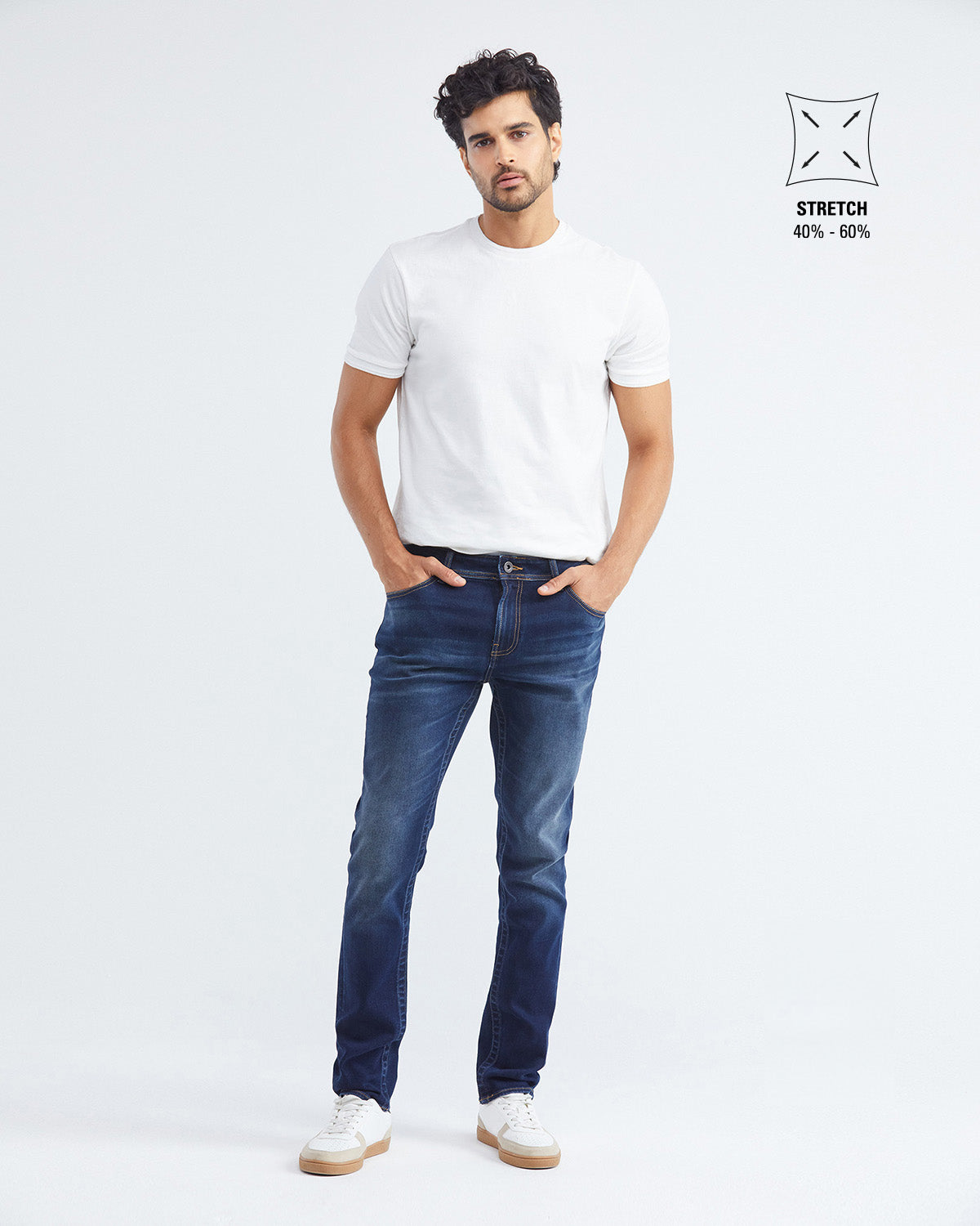 JEANS SLIM FIT DE TIRO MEDIO EN LAVADO OSCURO