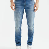 STRAIGHT FIT MID-RISE JEANS IN MEDIUM WASH