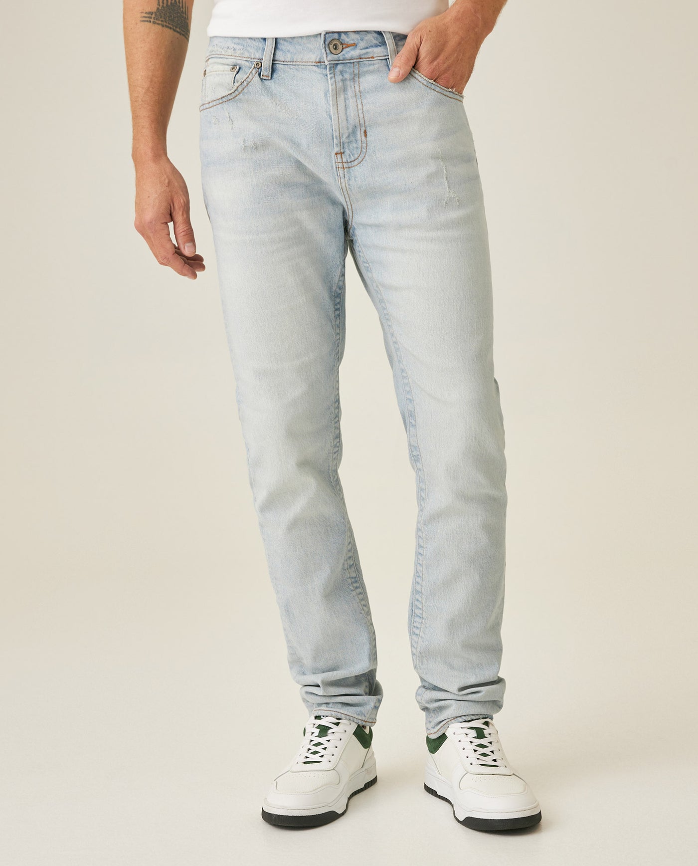 Mens Jeans Skinny Fit Mid Rise Light Wash Cotton Elastane Strategic Distressing Clean Silhouette - Blue 63_331H016_AZU154020_0