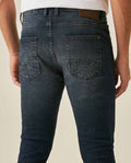 Mens Jeans Skinny Fit Low Rise Ultra Dark Wash Cotton Elastane Distressed Artisan Repairs Dramatic Contrast - Blue 63_331H028_AZU194052_7