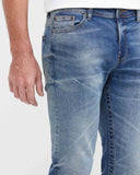 SLIM FIT MID-RISE JEANS IN MEDIUM WASH