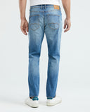 STRAIGHT FIT MID-RISE JEANS IN MEDIUM WASH