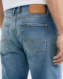 STRAIGHT FIT MID-RISE JEANS IN MEDIUM WASH