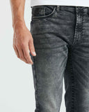 SLIM FIT MID-RISE JEANS IN DARK WASH