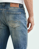 STRAIGHT FIT MID-RISE JEANS IN DARK WASH