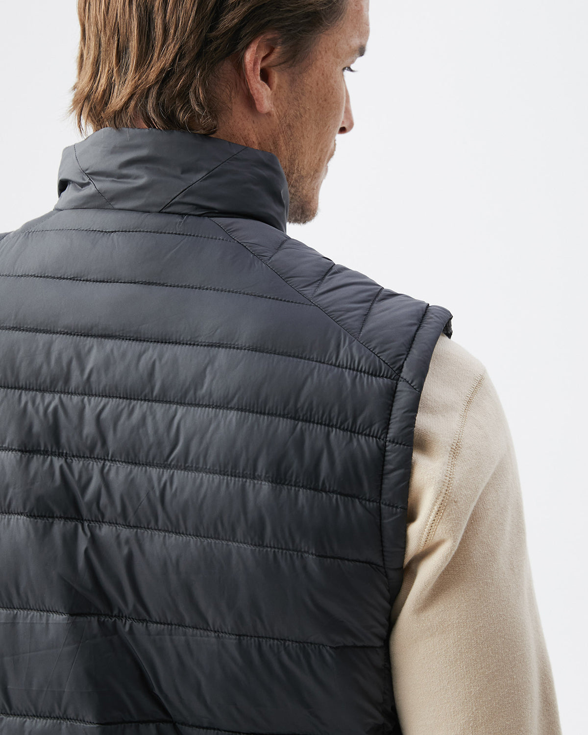 QUILTED TOGS PUFFER VEST IN BLACK