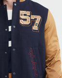 BOMBER VARSITY JACKET IN NAVY