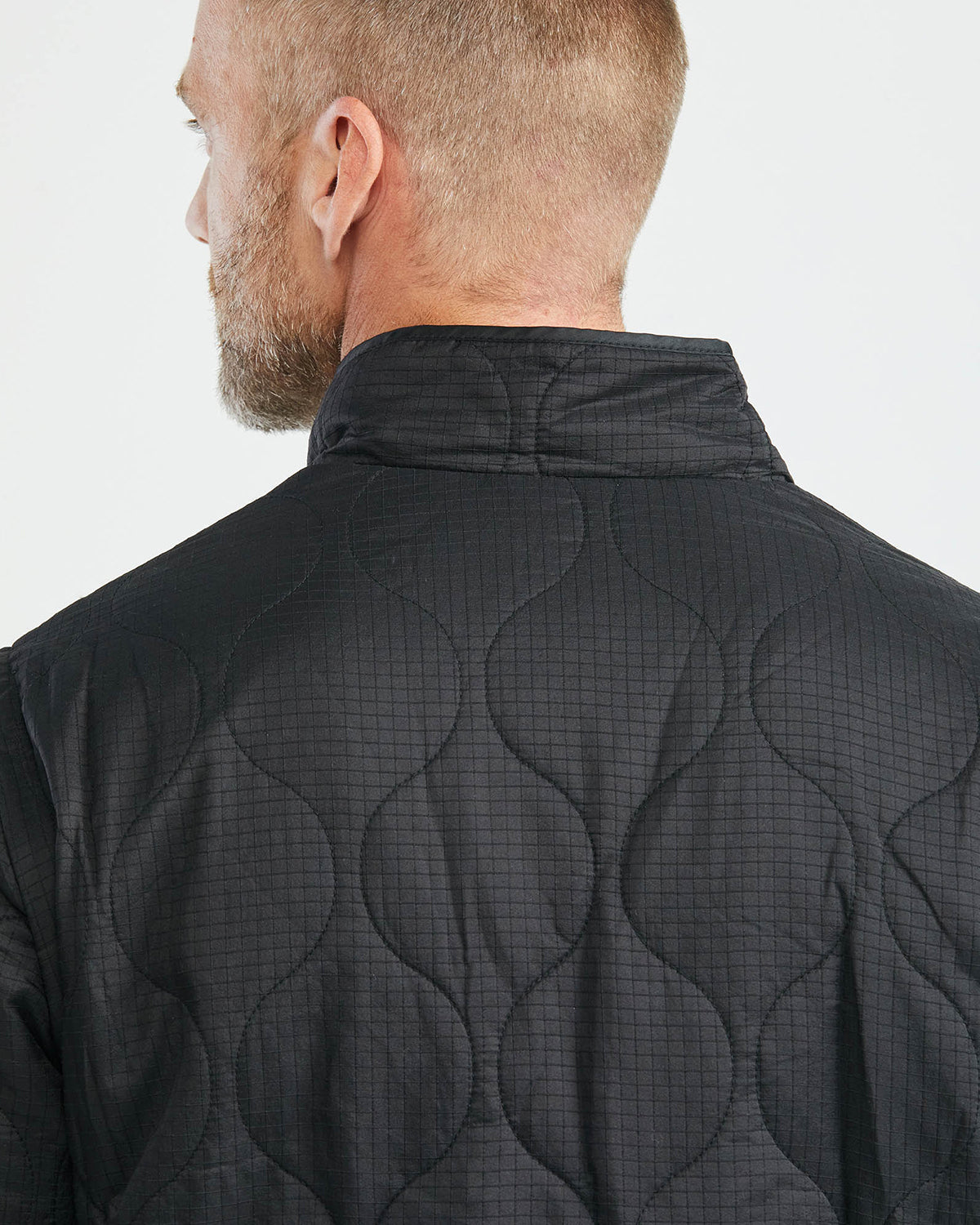 CONVERTIBLE LINING TOGS DOWN JACKET IN BLACK